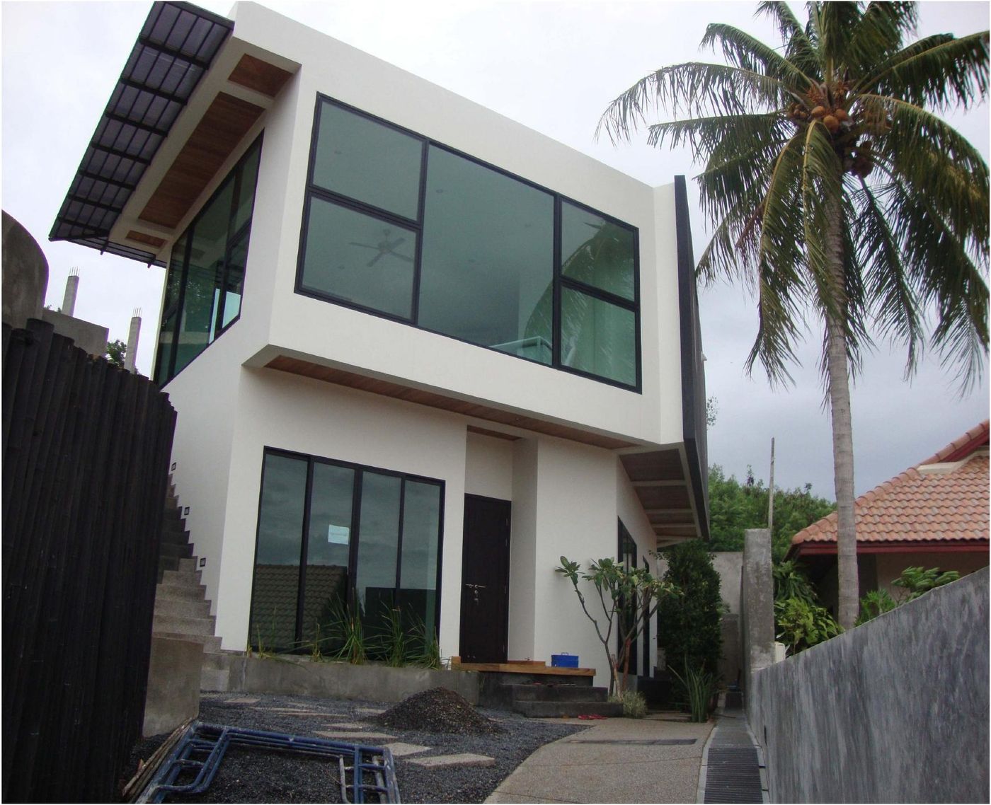 Rawai Hill Residence, finished exterior with sea-view glazing